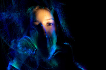 lightpainting portrait, new art direction, long exposure photo , light drawing at long exposure