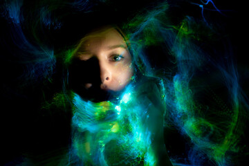 lightpainting portrait, new art direction, long exposure photo , light drawing at long exposure