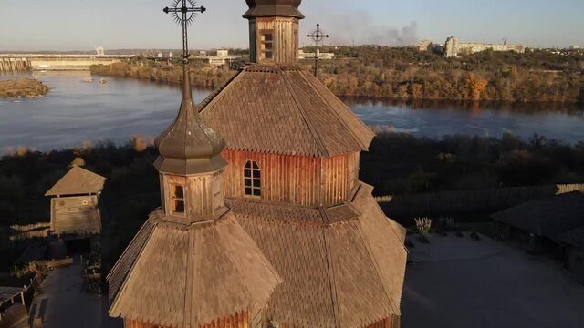 Khortytsya, Zaporozhye Sich drone, Dnipro Hydroelectric Power Plant, dam. 
Old church on the island of Khortitsa. Zaporozhye drone, Zaporizhia, Ukraine, over the dam.