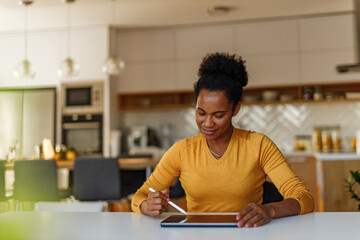 Positive woman, sitting on the chair.