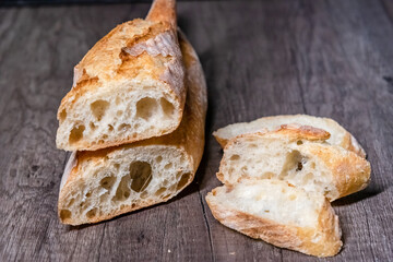Various rustic bread on a wooden board. Healthy food and farming concept