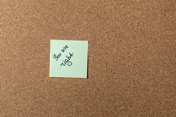 green sticker on brown table. color sticker, motivational, quote, and words, note, message you are right