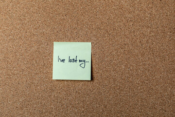 green sticker on brown table. color sticker, motivational, quote, and words, note, message I've lost my