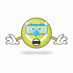 Obraz premium The Tennis ball mascot character is diving. vector illustration