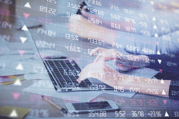 Multi exposure of woman hands typing on computer and financial chart hologram drawing. Stock market analysis concept.