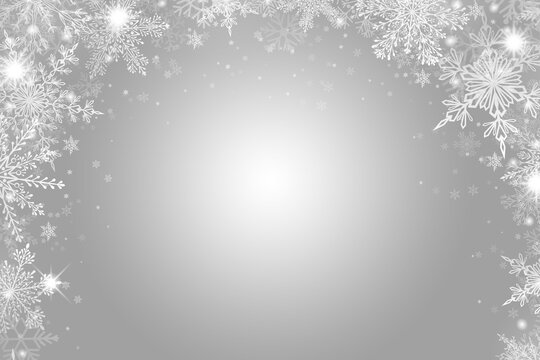 Snow background. Grey Christmas snowfall with defocused flakes. Winter concept with falling snow. Holiday texture and white snowflakes.