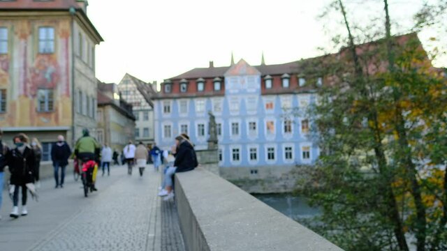 people in medical masks, tourists walk the streets of a European city of Germany Bamberg, business travel concept, travel, period of the covid-19 coronavirus pandemic