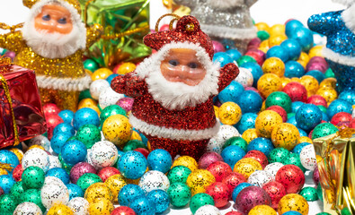 Obraz premium Santa Claus and Colorful balls on white background.