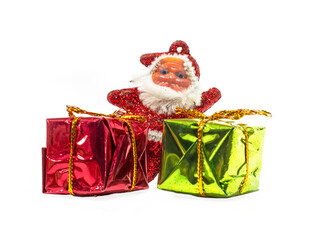 Santa Claus with gift box isolated on a white background.