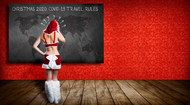 confused miss santa in front of a blackboard with a world map and message CHRISTMAS 2020 COVID-19 TRAVEL RULES on red background