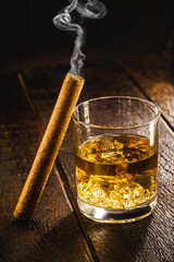 smoking cigar, smoke smoke. Glass of whiskey and alcoholic drink, concept of rest or lifestyle