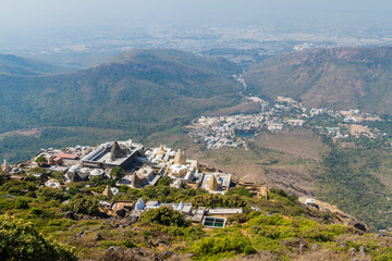 Jain temple at Girnar Hill, Gujarat state, India. Junagadh in the background.