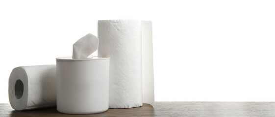 Different clean paper tissues on wooden table