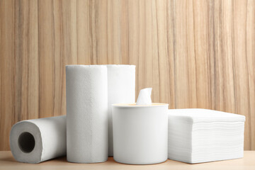 White clean paper tissues on wooden table