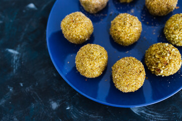 plant-based food, homemade fried vegan pesto risotto balls arancini