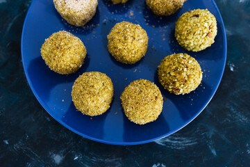 plant-based food, homemade fried vegan pesto risotto balls arancini