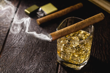 smoking cigar, smoke smoke. Glass of whiskey and alcoholic drink, concept of rest or lifestyle