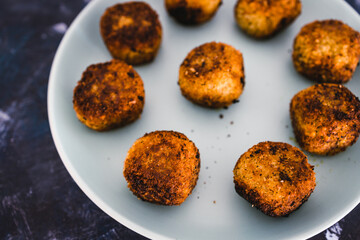 plant-based food, homemade fried vegan pesto risotto balls arancini