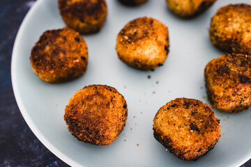 plant-based food, homemade fried vegan pesto risotto balls arancini