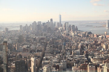 Fototapeta na wymiar New York Harbor and its skyscrapers from 86th floor of Empire State Building.