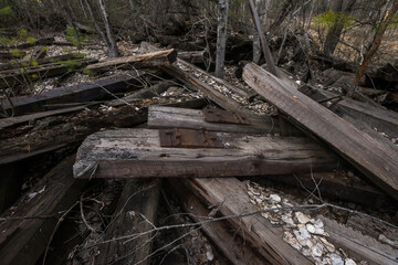 Old radioactive railroad ties at abandoned station Yanov near ghost town Pripyat