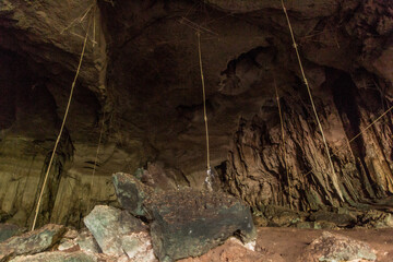 Ropes and bamboo structures used to collect guano in the Great Cave in Niah National Park, Malaysia