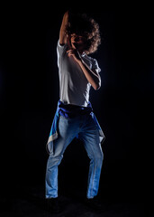 Young man with curly afro hiar