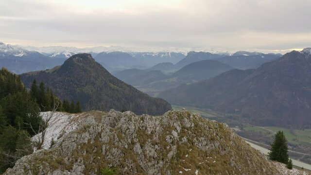 Aerial view moving forward shot, Scenic view of Peak of Wasserwand, Bavaria, Germany, Ridge trail and  mountain range in the background.