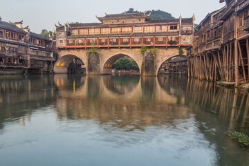 Hong bridge over Tuo river in Fenghuang Ancient Town, Hunan province, China