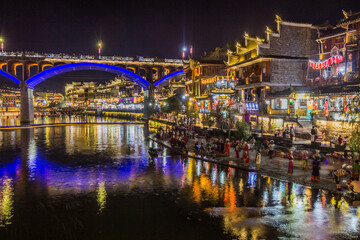 FENGHUANG, CHINA - AUGUST 13, 2018: Evening view of Fenghuang Ancient Town, Hunan province, China