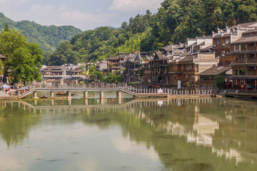 Fototapeta premium Footbridge over Tuo river in Fenghuang Ancient City, Hunan province, China