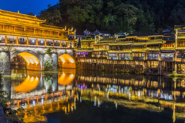 Evening view of Hong bridge in Fenghuang Ancient Town, Hunan province, China
