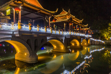 Night view of a bridge in Fenghuang Ancient Town, Hunan province, China