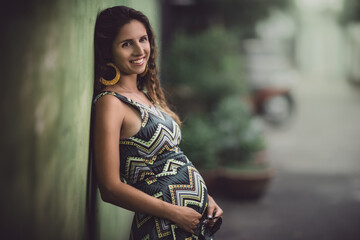 Obraz na płótnie Canvas Outdoor portrait of a pregnant woman