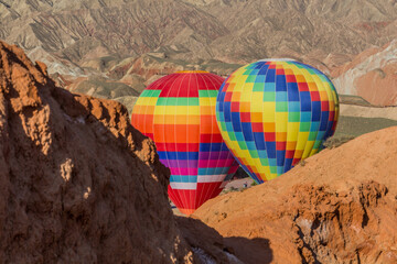 Hot air balloons in Zhangye Danxia National Geopark, Gansu Province, China