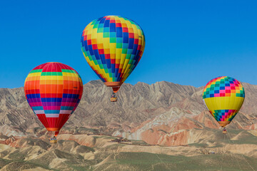 Hot air balloons in Zhangye Danxia National Geopark, Gansu Province, China