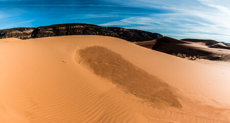 Wind Blown Sand Dunes With The Moquith Mountains  In The Distance, Coral Pink Sand Dunes State Park, Utah, USA