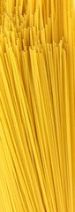 Yellow pasta, Spaghetti ready for cooking. isolated on the white background. uncooked spaghetti noodles. Uncooked whole wheat pasta.