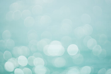 Turquoise blur bokeh water empty teal background concept for modern eco spring banner, mint green...