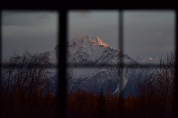 View of Alaska's Chugach Range through a window