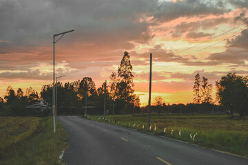 sunset over the road