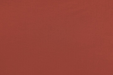 Fototapeta premium Scarlet homogeneous background with a textured surface