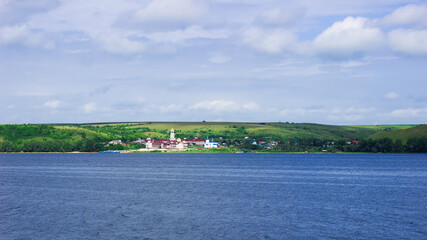 The river Volga and Vinnovka Mountains, Samara region, Russia. Holy Mother of God Monastery in Vinnovka village.