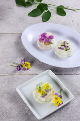 Puding mooncake or pudding jelly mooncake with edible flowers.