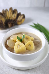 Kolak. Kolak (or kolek) is an Indonesian dessert based on banana, palm sugar or coconut sugar, coconut milk, and pandanus leaf