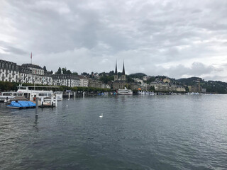 Fototapeta premium lake view with Church of St. Leodegar or Hofkirche St. Leodegar in Lucerne city, Switzerland
