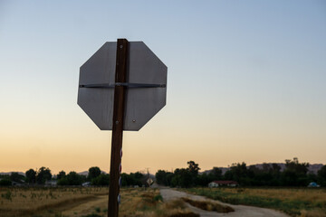 railroad crossing at sunset