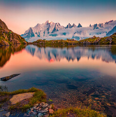 Superb summer scene of Lac Blanc lake with Mont Blanc (Monte Bianco) on background, Chamonix location. Amazing evening view of Vallon de Berard Nature Preserve, Graian Alps, France, Europe.