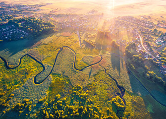 Aerial landscape photography. Colorful summer view of flooded valley. Misty morning scene of snake shape Seret river. Wonderful sunrise on Ternopil countryside, Ukraine, Europe.