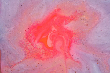 Hand painted background with mixed pink and yellow paints.Abstract fluid acrylic painting.Soft color texture.